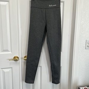 Soft gray polyester cotton with 3 1/2”band stretch and 13”. Inseam 28”